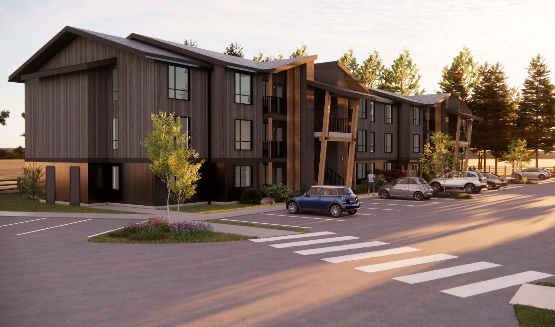 a building with cars parked in front